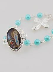Pin's Decina Perle Blu